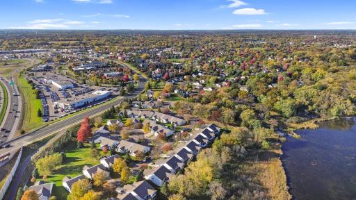 A beautiful autumn view of Lake's Edge and the surrounding neighborhood, where lakeside scenery and everyday conveniences are close to home