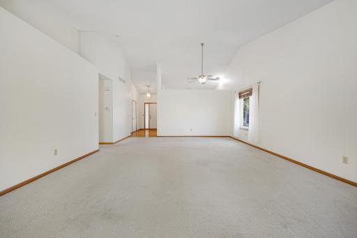 With plenty of room for both dining and relaxing, this versatile living space offers endless possibilities for making it your own