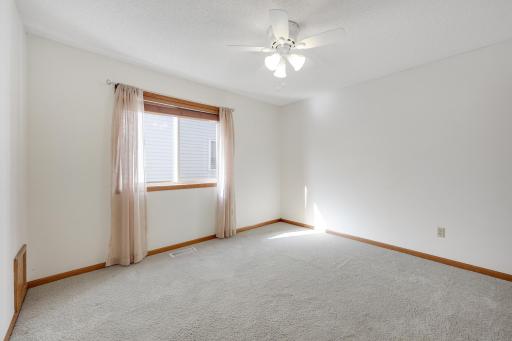 A versatile second bedroom offers flexibility for guests, a home office, or creative space to make your own