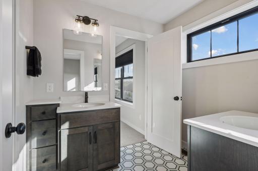 Shared bathroom between the second and third bedroom