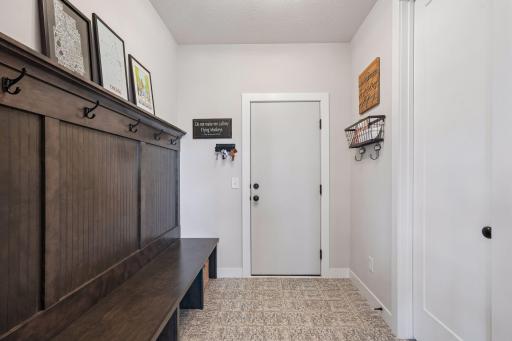 Mudroom off the garage with organizational features