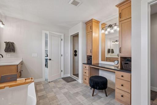 Separate vanity allows for extra storage and a designated make-up counter