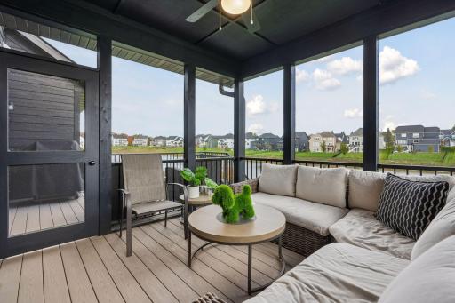 Step out to the deck from the screened porch