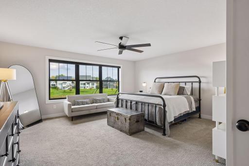 Welcome to the luxurious primary bedroom suite
