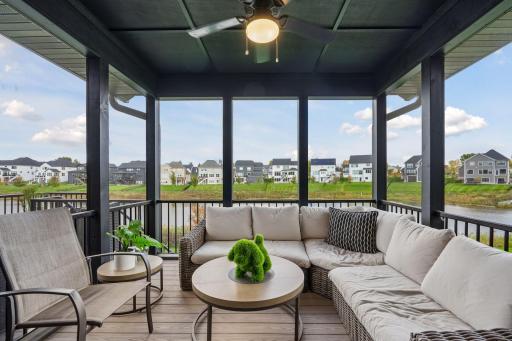 Step into the screen porch to enjoy the indoor/outdoor lifestyle.