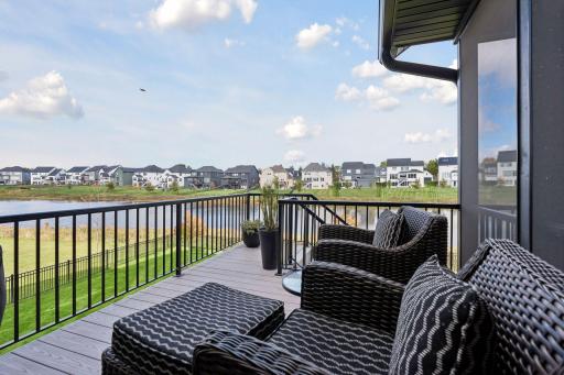 Enjoy the pond views from the Azek deck and aluminum railing