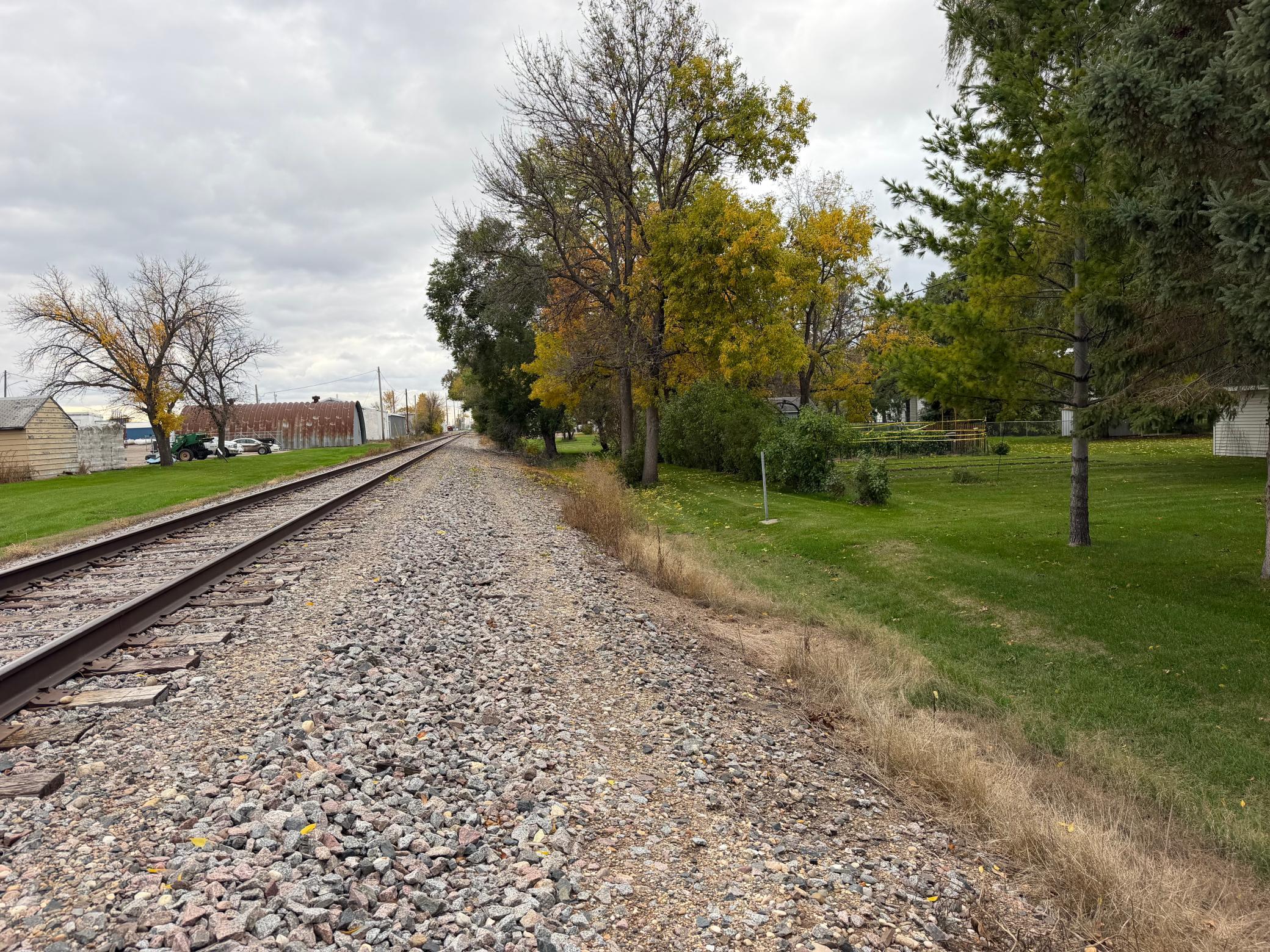 Backs to railroad tracks that only runs about once a week with a slow train