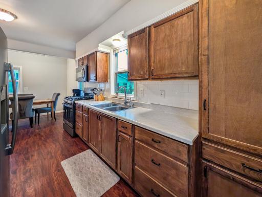 Plenty of counter space and cabinetry make this kitchen a practical place to prepare meals and enjoy everyday moments.