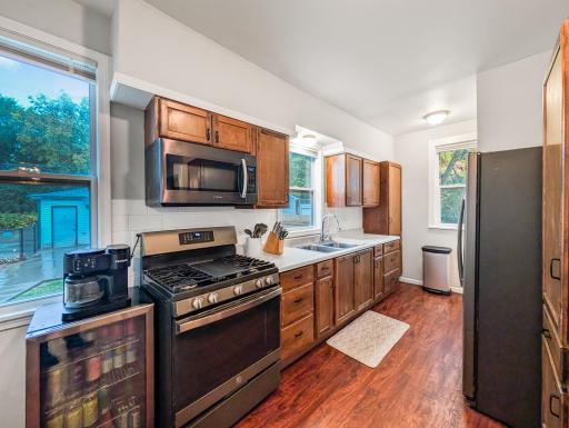 Kitchen features stainless steel appliances and bright kitchen windows!