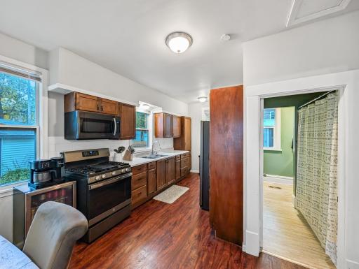 A functional kitchen with warm wood cabinetry and a layout that makes everyday cooking feel right at home.