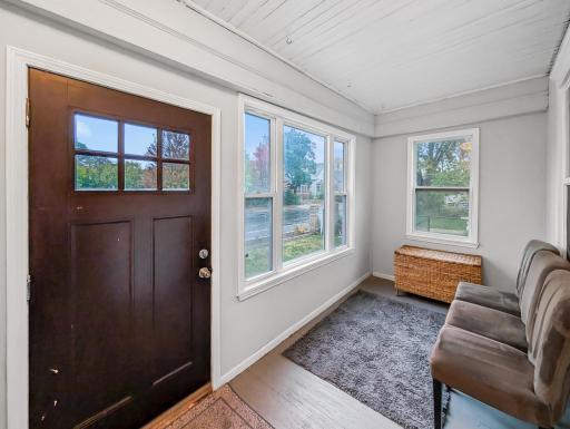 A bright and peaceful spot to enjoy your morning coffee or unwind while taking in views of the yard.