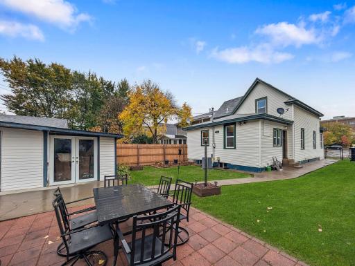 Enjoy summer evenings, outdoor dining, and time with friends in the backyard, complete with a brick patio and fenced yard.