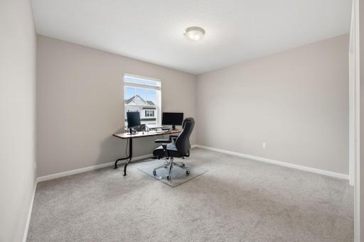 4 of 4 upper level bedrooms. 12 x 11.5. Currently used as WFH office.