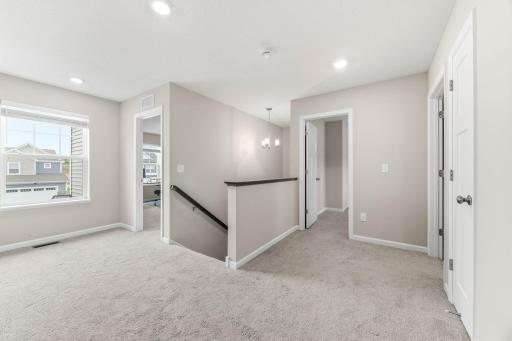 Perfect landing spot for you and yours. Four bedrooms and laundry on the upper level.