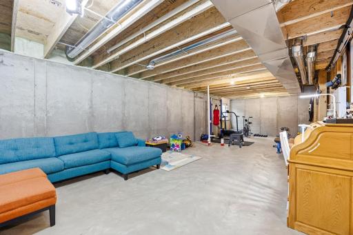 Poured concrete foundation, please and thank you. However, bring your vision and design this lower level to your lifestyle.