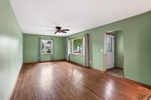 Living room and front door with lots of natural light.