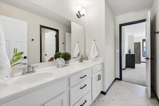 Jack and Jill Bathroom with dual sinks connecting 3rd and 4th Bedrooms