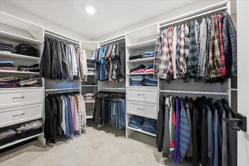 Amazing walk-in closet with custom shelving
