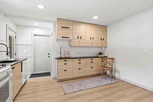 Thoughtful finishes and ample storage make this kitchen both functional and inviting.