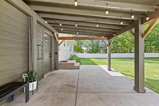 The main level also provides walkout access to the fully fenced backyard, offering multiple spaces for outdoor enjoyment and entertaining.