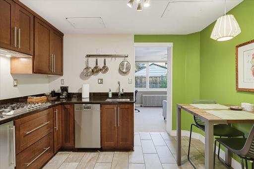 Lower level unit has a small eat in kitchen