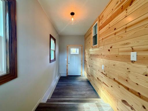 This knotty pine wall in the mud room welcomes you home