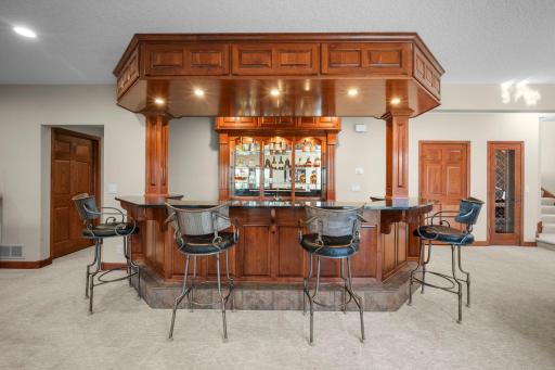 Custom wet bar with display case for all your treasures