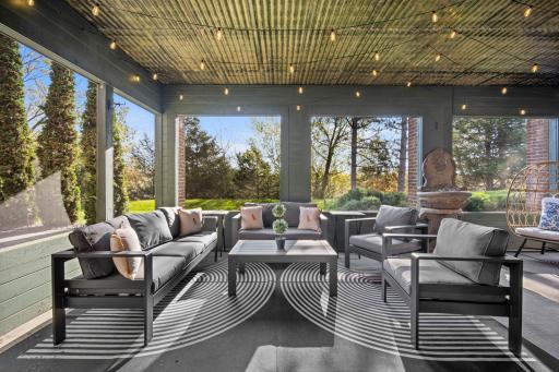 Enjoy your summer nights in the screened in 3-season porch