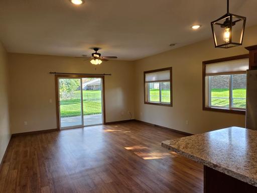 Large windows and patio door add lots of light.