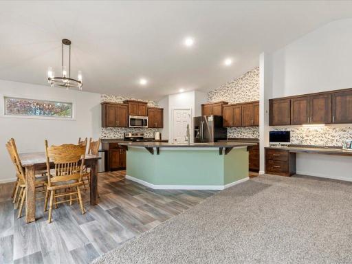 Center Island with raised breakfast bar that could seat a crowd