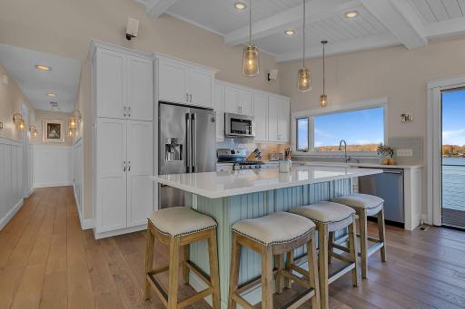 Beyond the beautiful kitchen, discover a practical main-level layout with an oversized utility closet for all those extras, a nearby bathroom, and primary bedroom.
