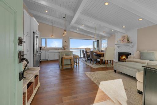 Designed to embrace its spectacular waterfront setting, expansive windows showcase panoramic views while sliding glass doors provide direct deck access from every bedroom, the family room, and dining room.
