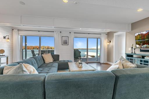 The lower-level family room provides a second living area, giving family and guests plenty of room to spread out and enjoy their own space.
