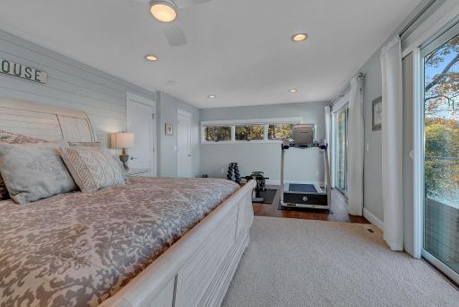 There's room for more than just sleeping! This generously sized primary bedroom offers plenty of space for a sitting area, exercise equipment, or whatever suits your lifestyle.