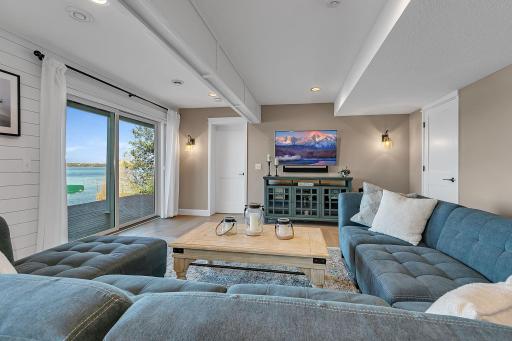 A great space for movie nights, game days, or entertaining friends and family! Plenty of room to gather, with convenient access to the covered deck.