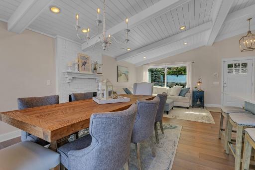 Plenty of room to gather around the table for family dinners, holiday celebrations, or a friendly game night, with a comfortable sitting area just steps away.