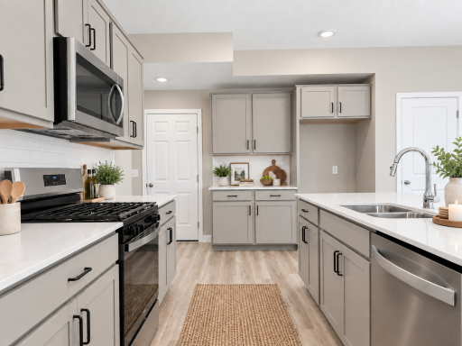 Enjoy plenty of room to cook, gather, and entertain in this spacious, open-concept kitchen. *Photo of similar home. Virtually staged.