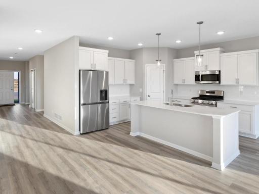 PHOTO OF A DIFFERENT HOME WITH SIMILAR PLAN. FINISHES MAY VARY.
