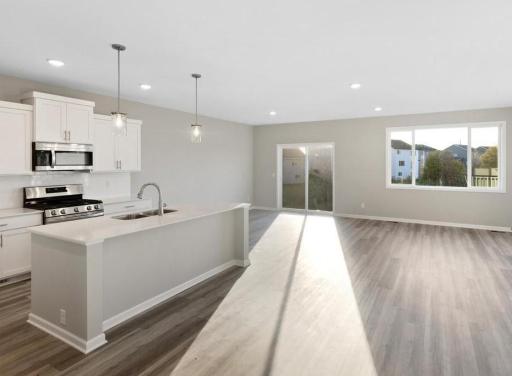 PHOTO OF A DIFFERENT HOME WITH SIMILAR PLAN. FINISHES MAY VARY.
