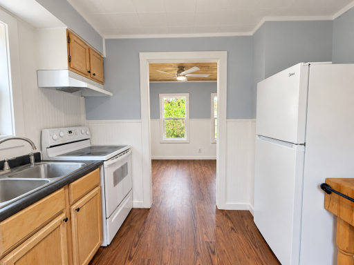 Brightened galley kitchen with natural wood-14.png