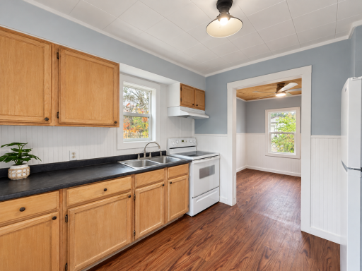 Natural-light kitchen with wood cabinets-16.png