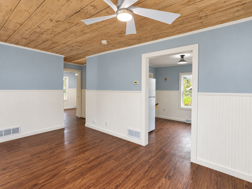Brightened living room with kitchen doorway-11.png