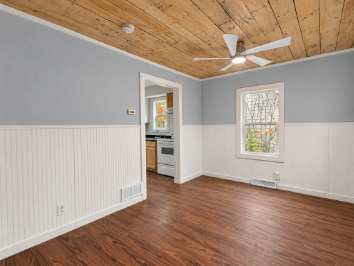 Brightened living room with kitchen doorway-12.png