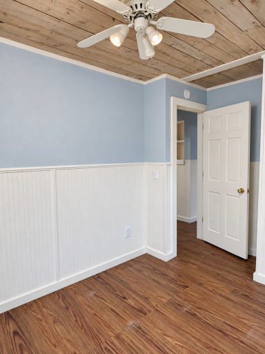 Brightened rustic bedroom with open door-3.png