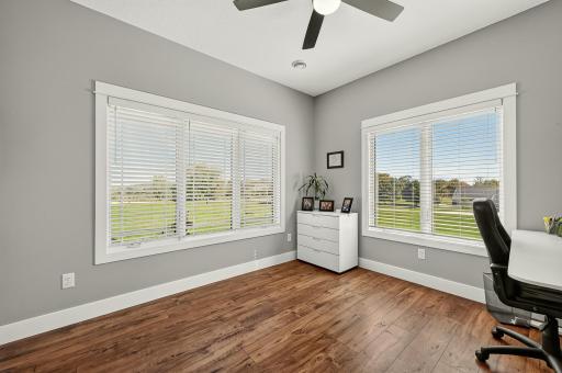 Spacious main floor bedroom with walk-in closet.