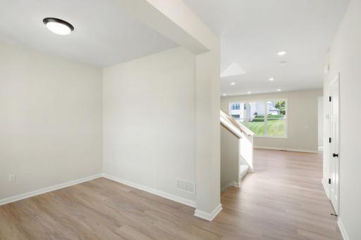 The flex room to the left, when you enter the beautiful home.