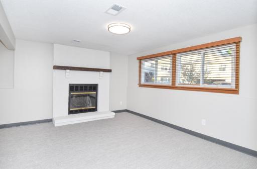The Quad Style Townhomes Feel So Much Like Single Family Living-Where Else Do You Get a Family Room Complete With a Wood Burning FP? *NOTE Current Seller Believes Long Term Homeowner Never Used It-Sold AS-IS!