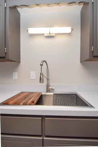 Functional & Fantastic! This BRAND NEW SINK & FAUCET SET Complete with Cutting Board & Drying Rack...You Will LOVE This Feature! Do Not Miss the Super Cute & SO Much Brighter Light Above the Work Area Too!