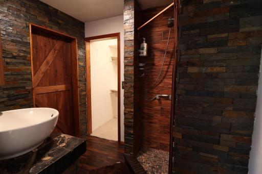 Primary Bathroom W/ attached walk-in closet