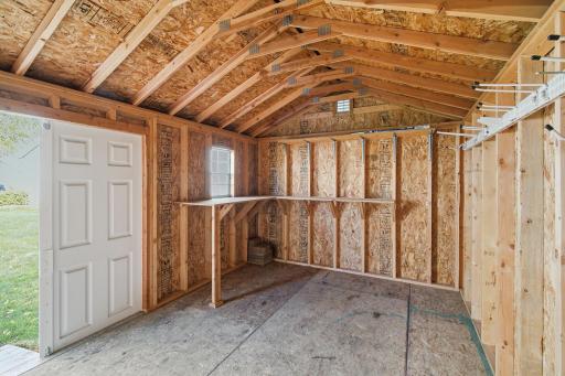 The large shed has plenty of room for all of your tools and equipment!